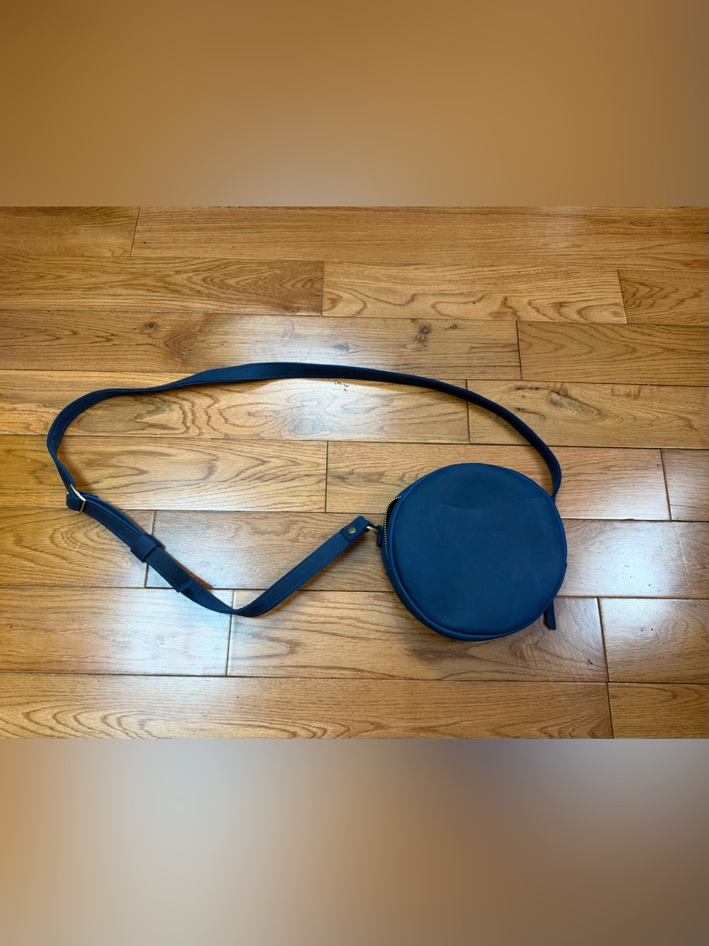 Portland Leather Nubuck Leather Small Round Crossbody Bag